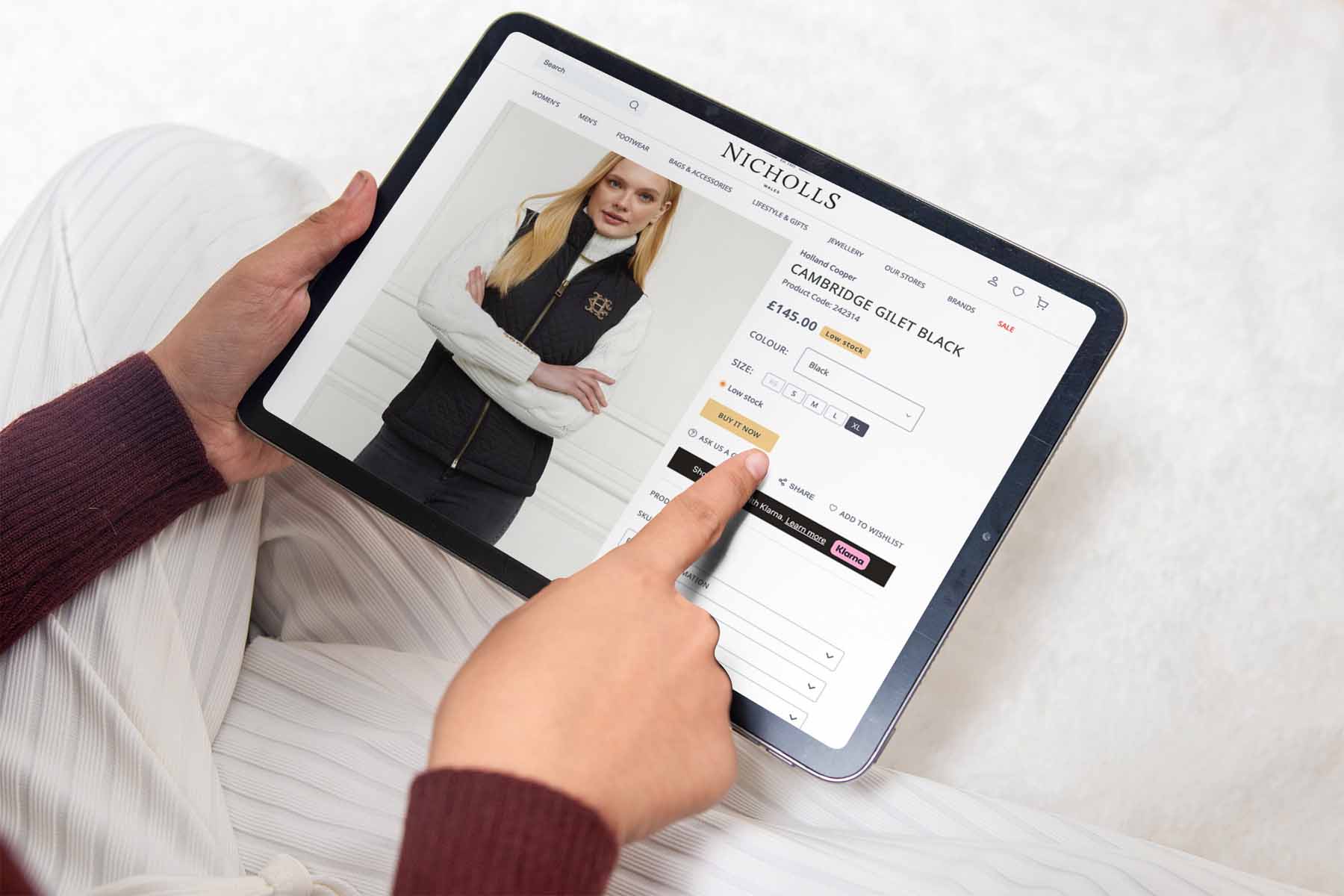 Nicholls ecommerce website homepage displayed on an iPad