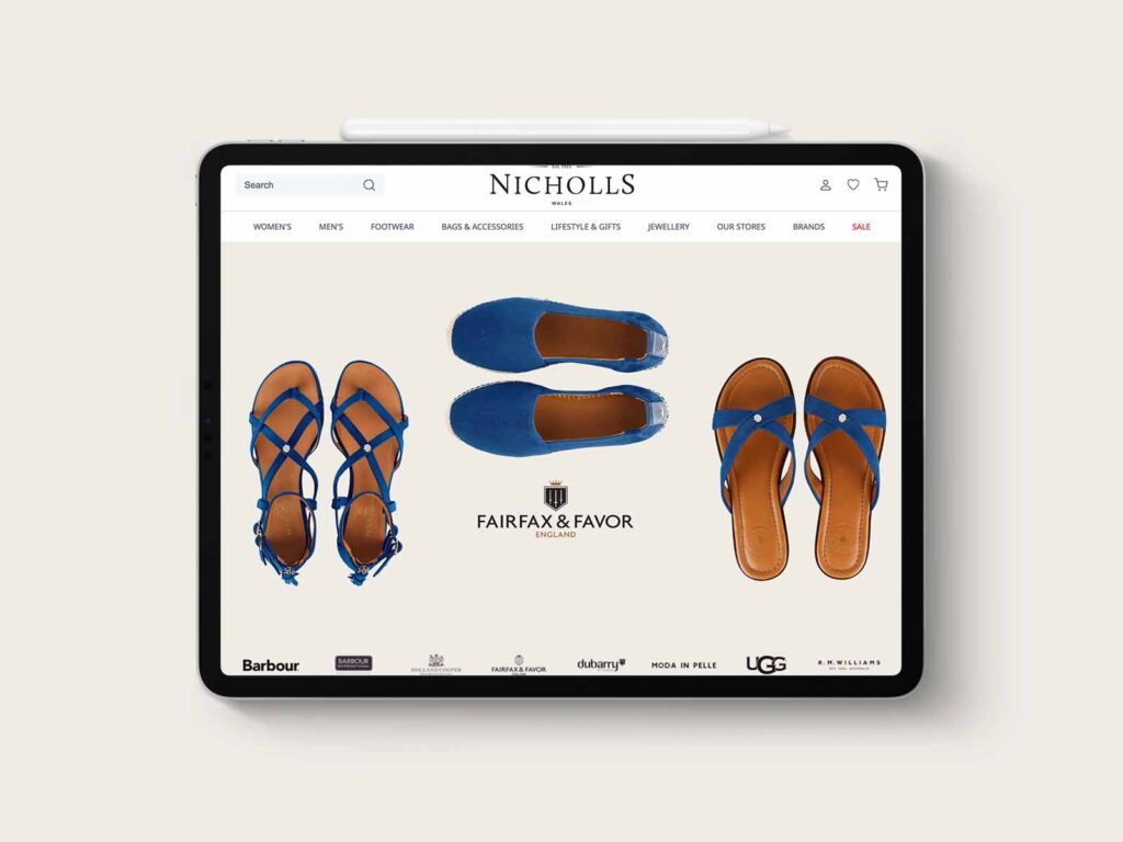 Nicholls ecommerce website homepage displayed on an iPad