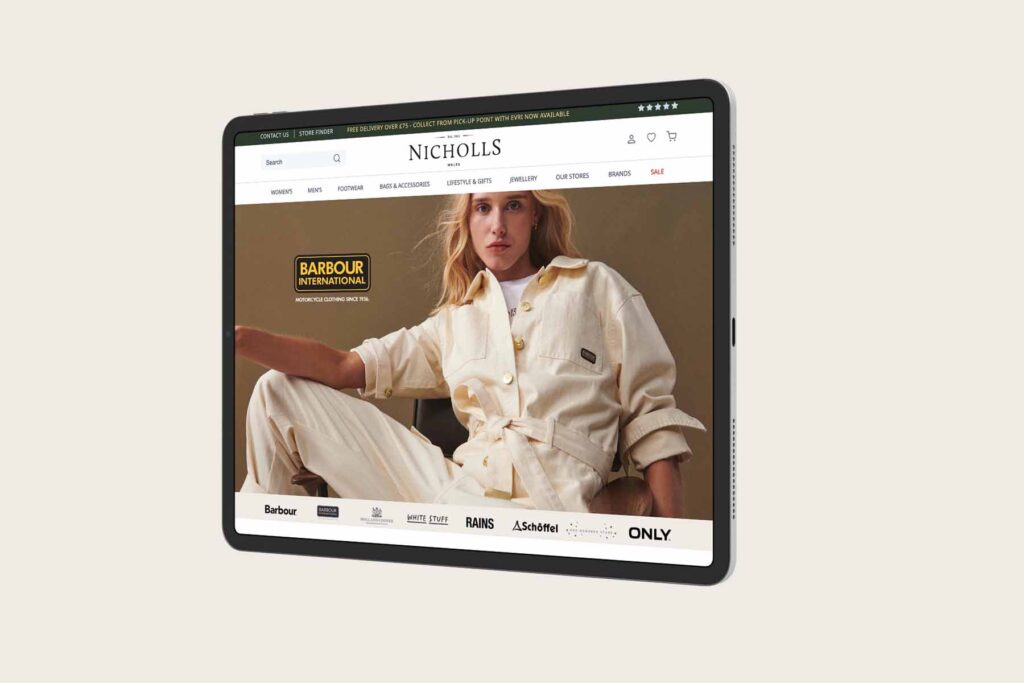 Nicholls ecommerce website homepage displayed on an iPad